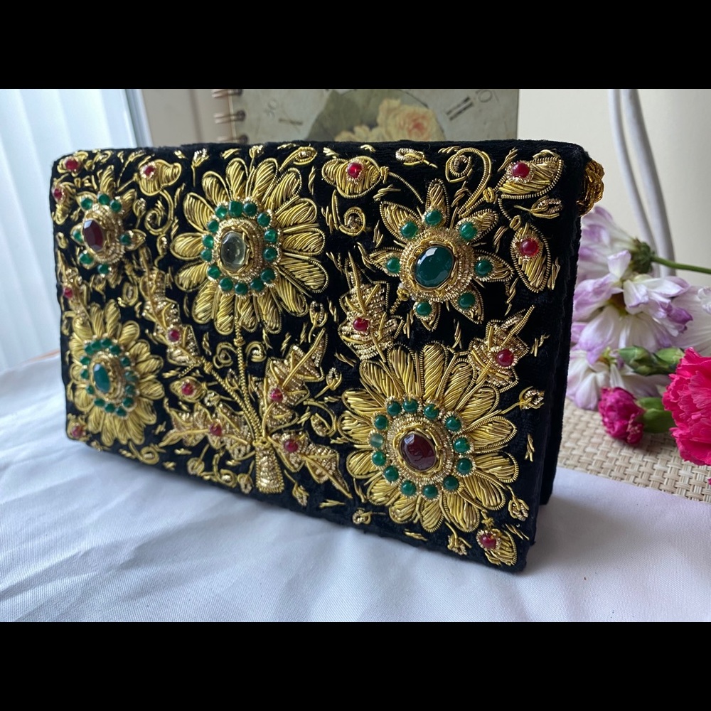 Black velvet gold metal embroidered clutch.